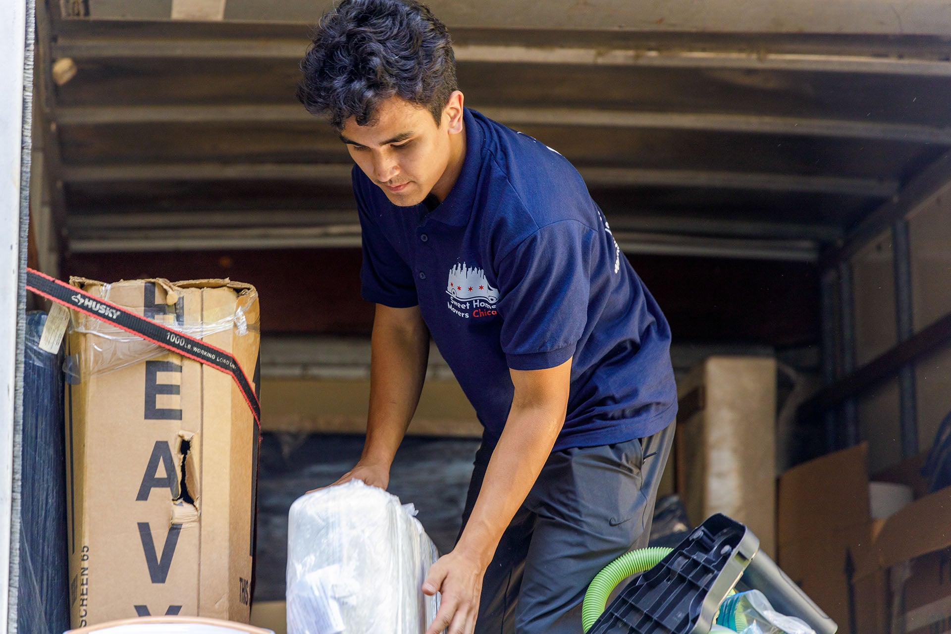 Mover organizing items in a truck